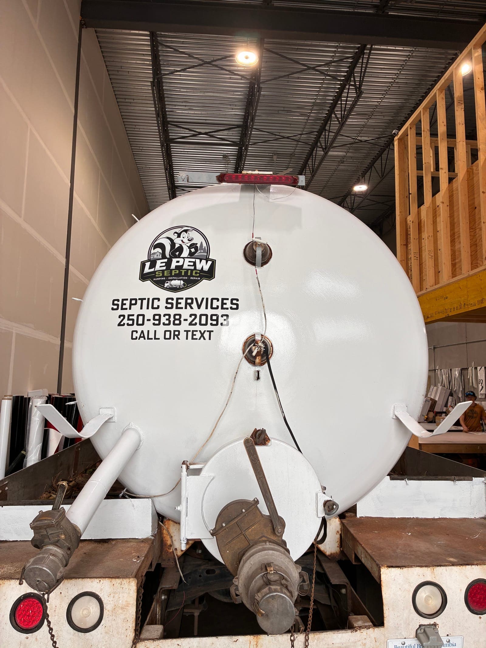 The Le Pew Septic pump truck parked at the shop in Vernon